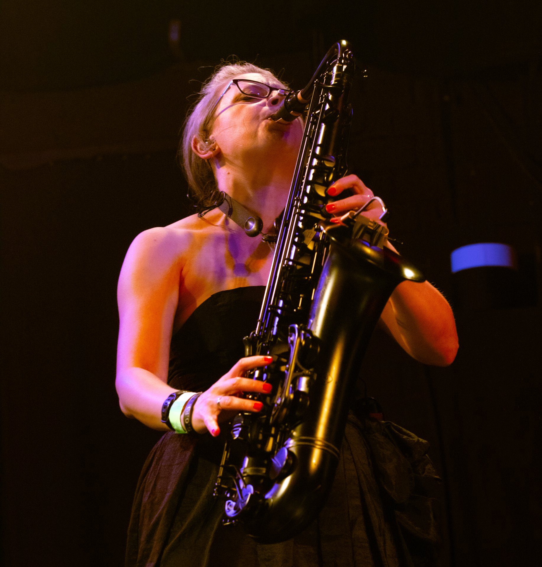 Liz Mitchell playing tenor saxophone