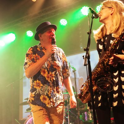 Liz Mitchell on stage with ska band